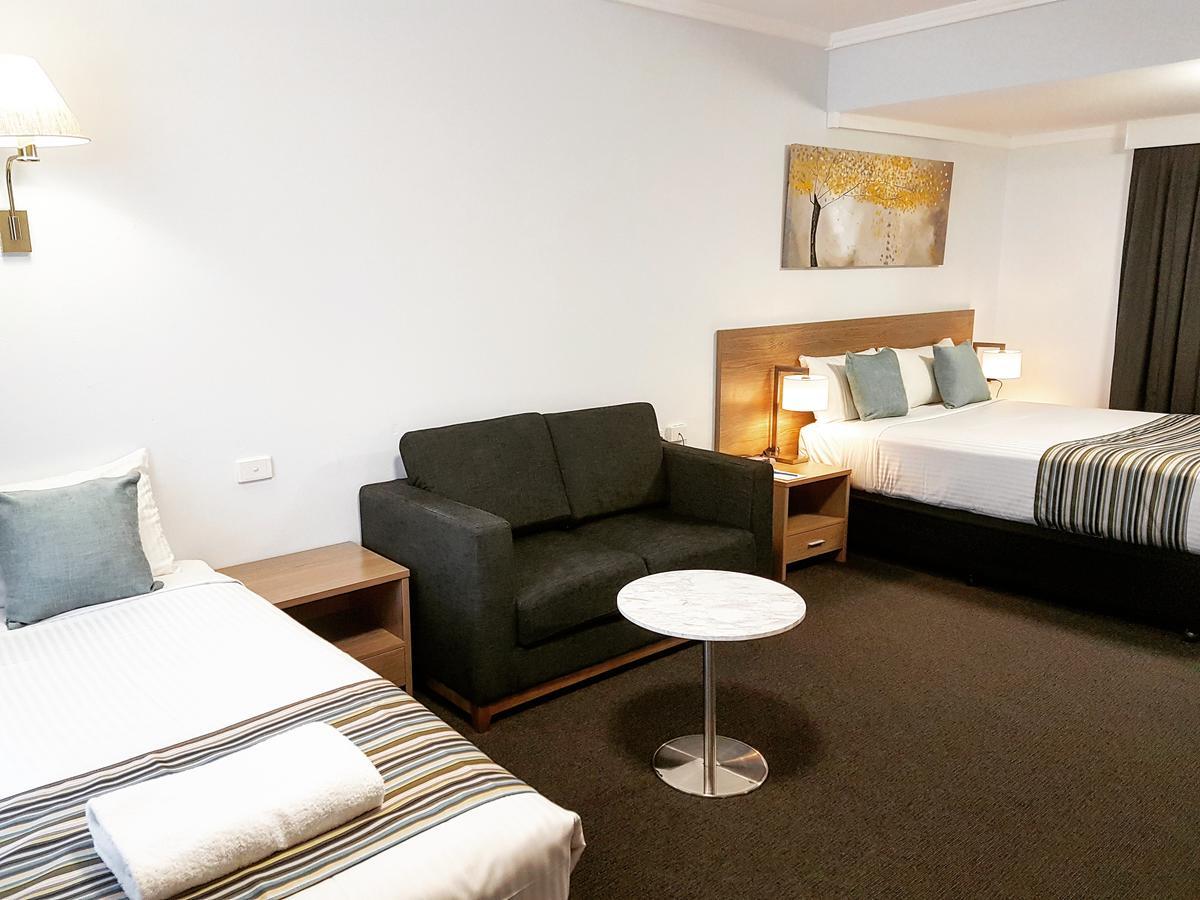 Mid City Motor Inn Singleton Buitenkant foto